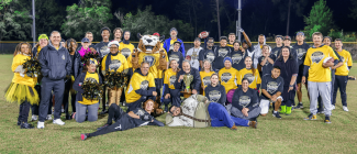 Group Photo of PHSC students, faculty, and staff at the flag football engagement game.