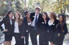 Group of seven student ambassadors at an event on campus